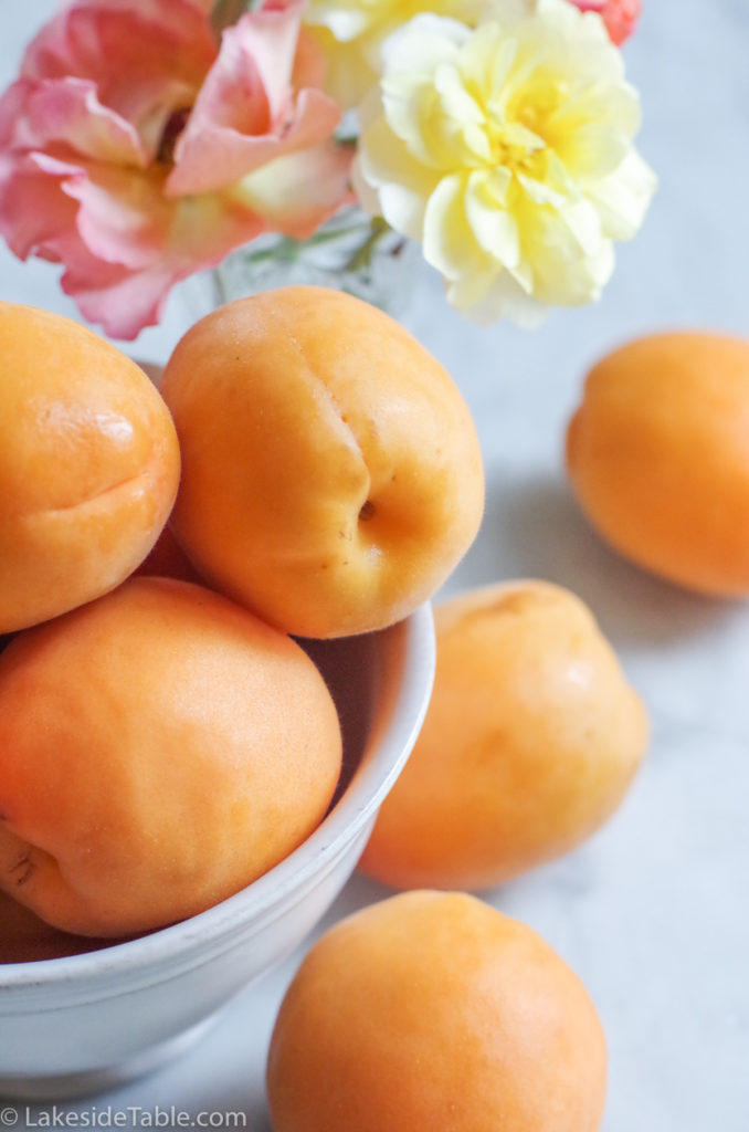 bowl of whole apricots getting ready to be put in an apricot tart