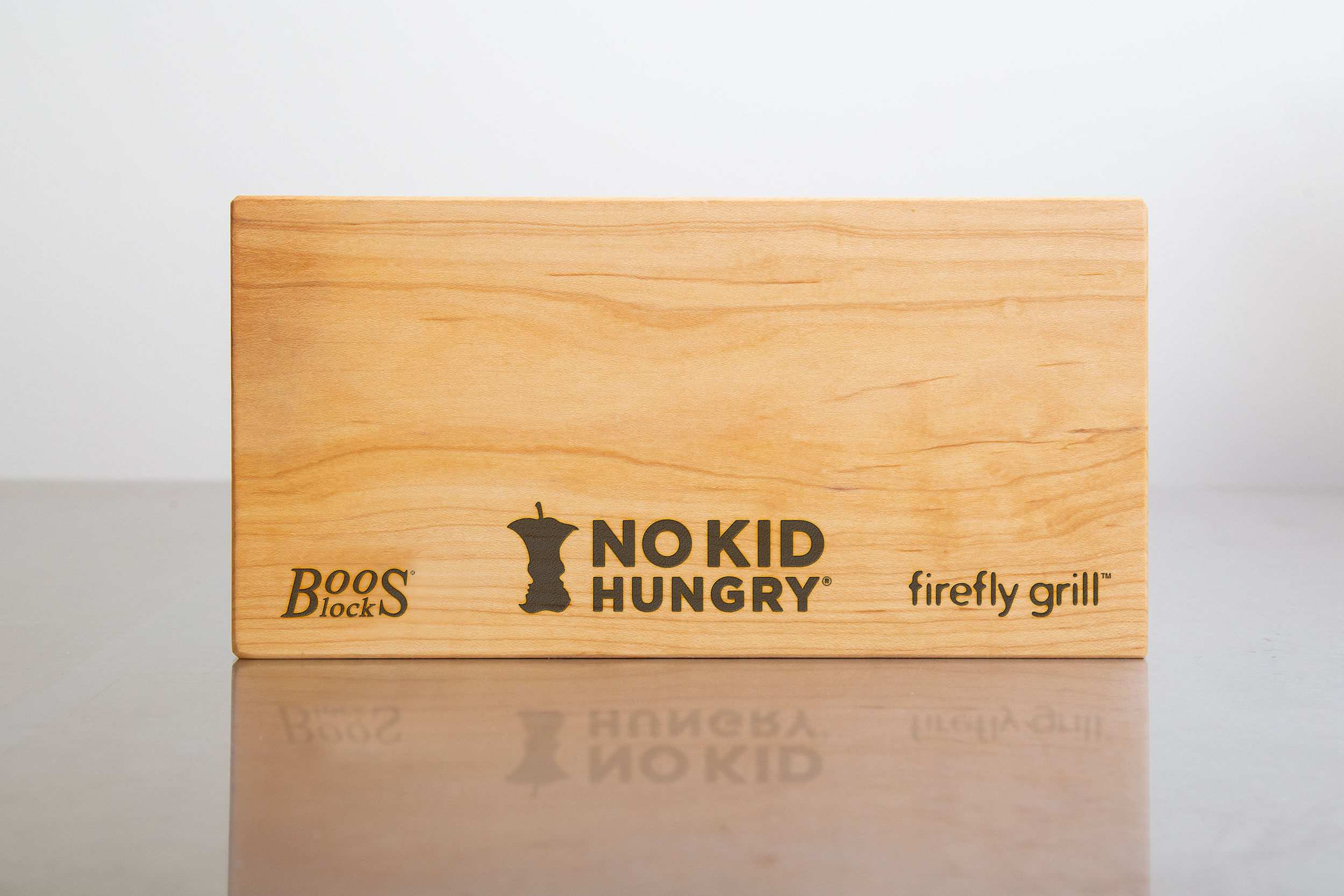 Boos butcher block with Firefly Grill and No Kid Hungry