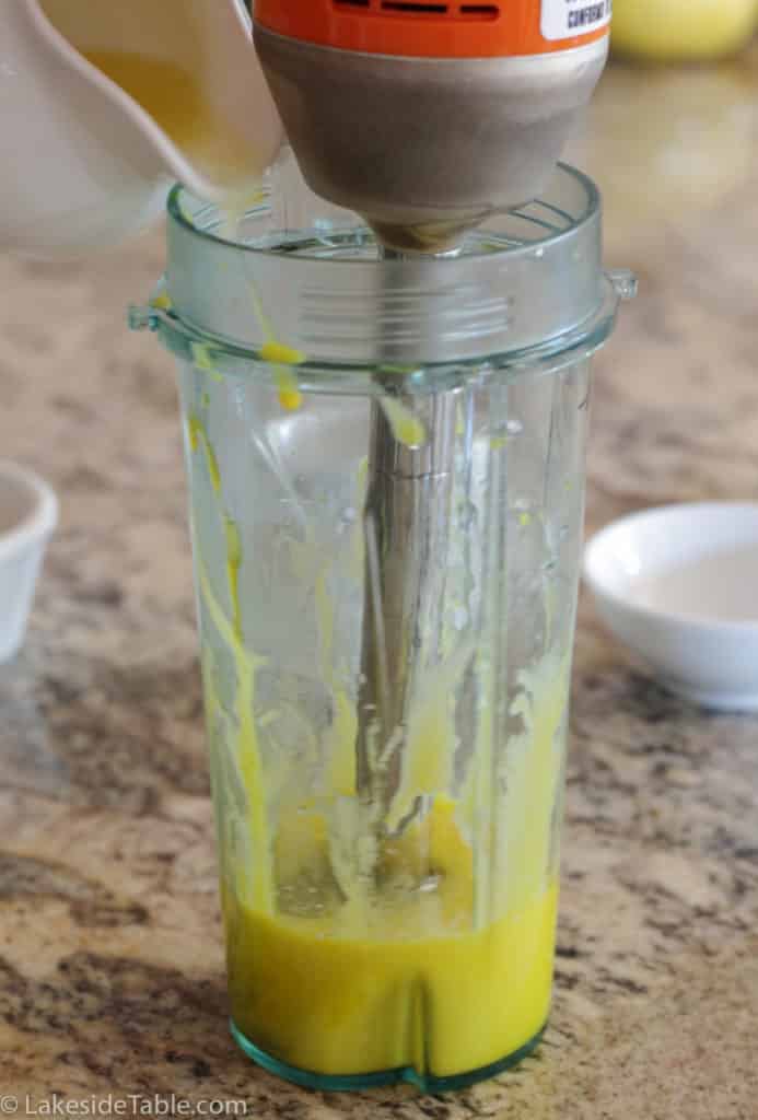 sauce being made with immersion blender