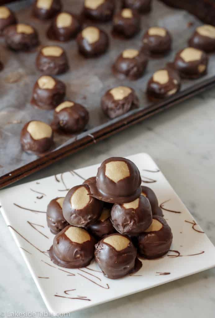 buckeye candy recipe with plated buckeyes on a plate