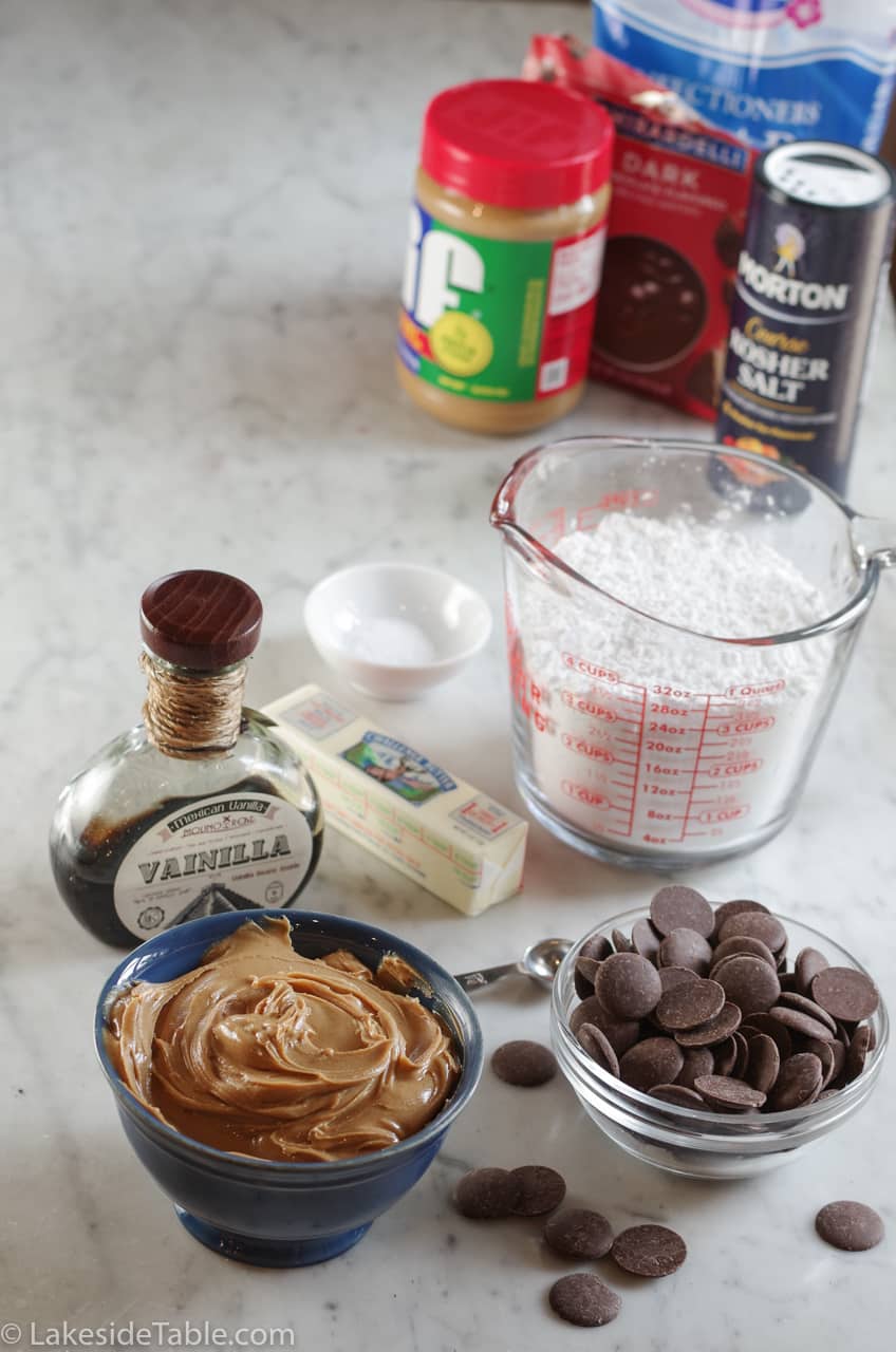 Ingredients for the buckeye candy recipe: powdered sugar, butter, salt, vanilla, peanut butter & chocolate 