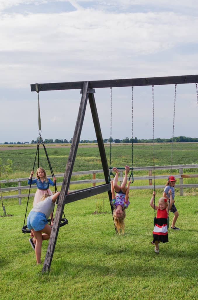 Buckeye Friends School kids playing on swings