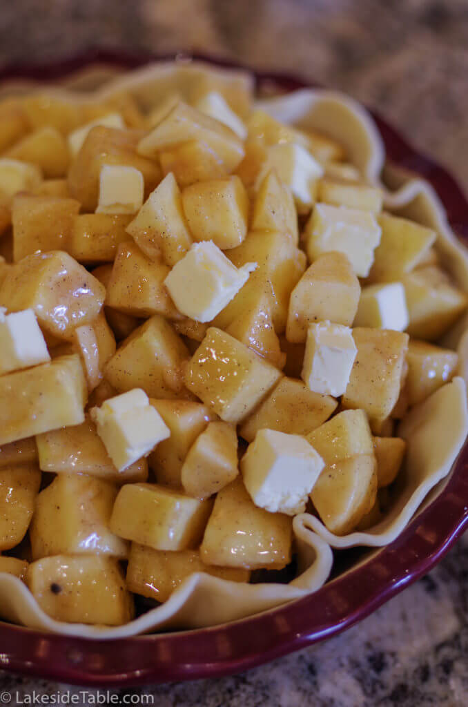 diced apples in pie dish 
