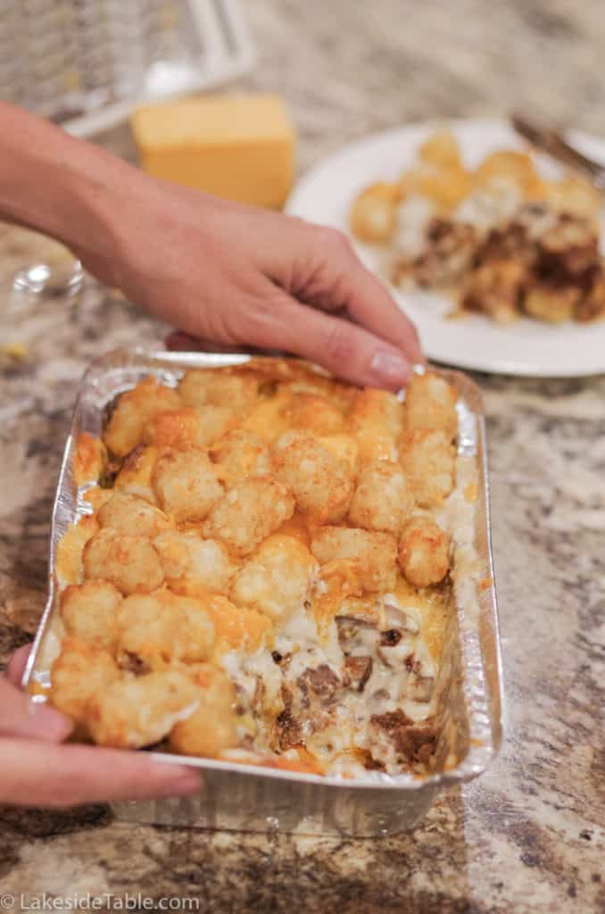 golden brown tater tots topped over creamy beef and mushrooms