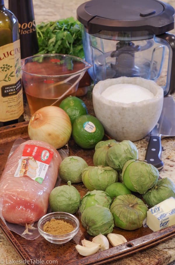 Ingredients: tomatillos, pork, lime, cilantro, chicken broth, olive oil, salt, onion, cumin and garlic