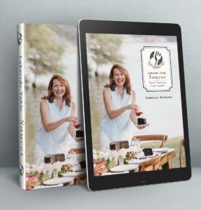 cookbook shown as a hardback and on a tablet