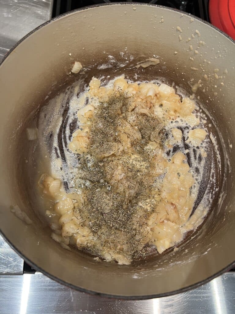Roux bubbling with dried thyme
