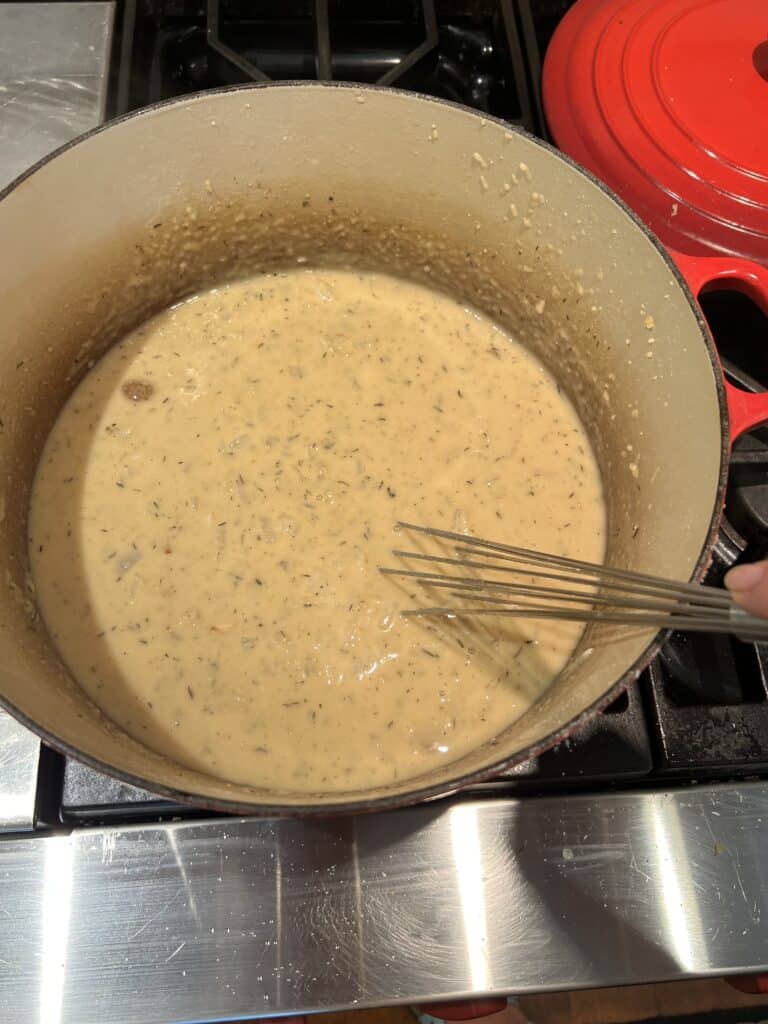 beer cheese soup after adding the chicken stock