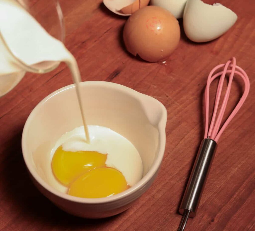 mixing the yolks and cream